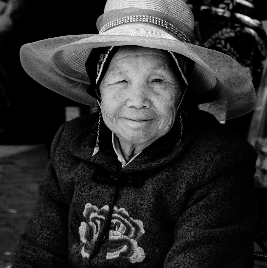 Portrait of an older Croatian woman with grey hair smiling gently